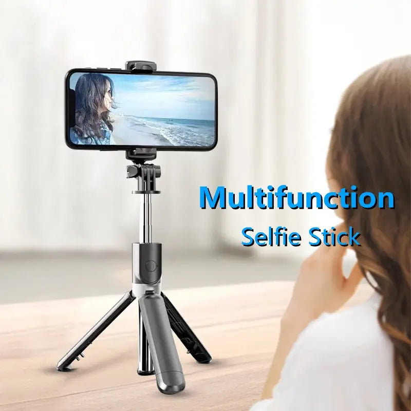 a woman taking a selfie with a smartphone on a tripod