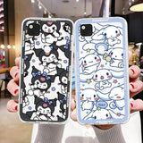 A woman holding two iphone cases with cartoon characters on them