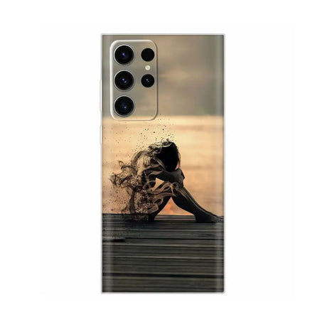 a woman in the water with her head down phone case