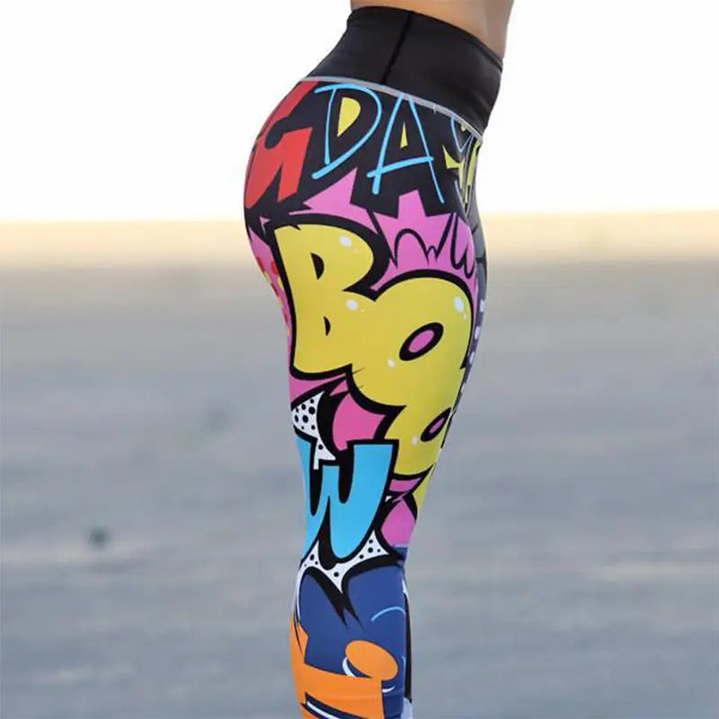 a woman wearing colorful graffiti leggings