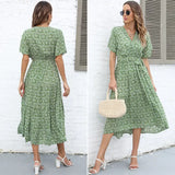 the person dress in green floral