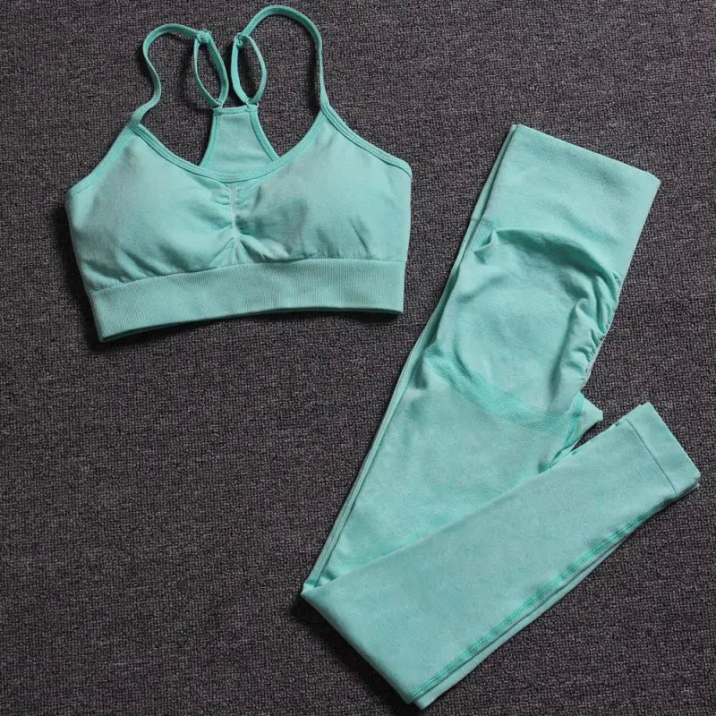 a green sports bra top and leggings