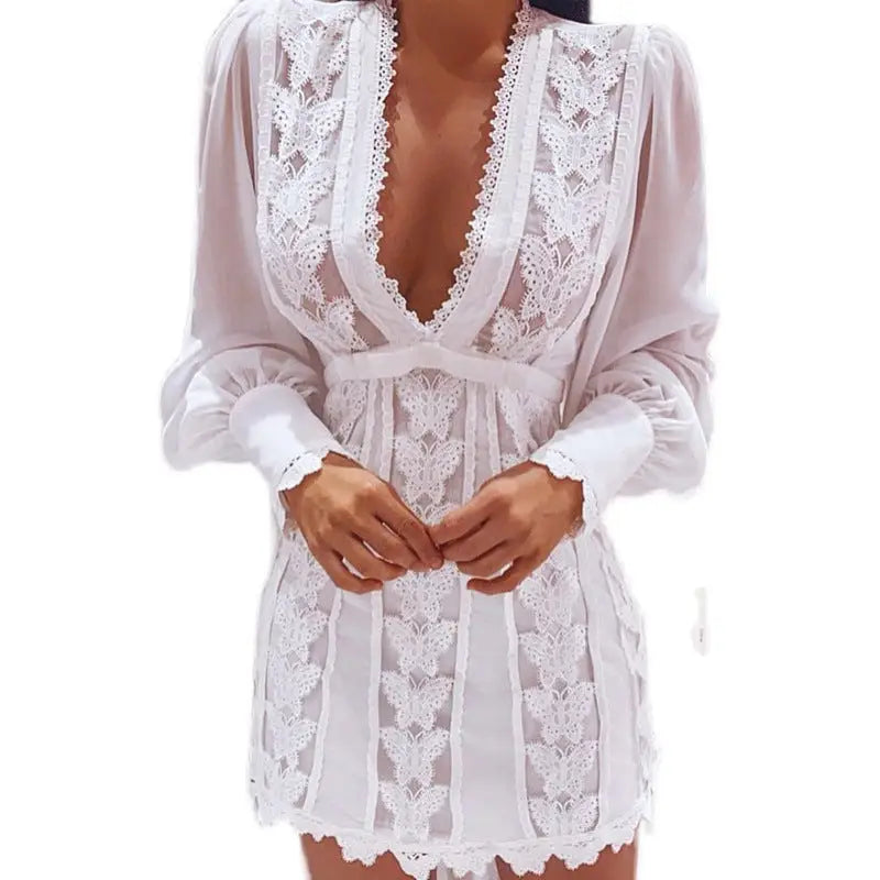 a woman wearing a white lace robe