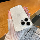 a woman holding a white glitter case