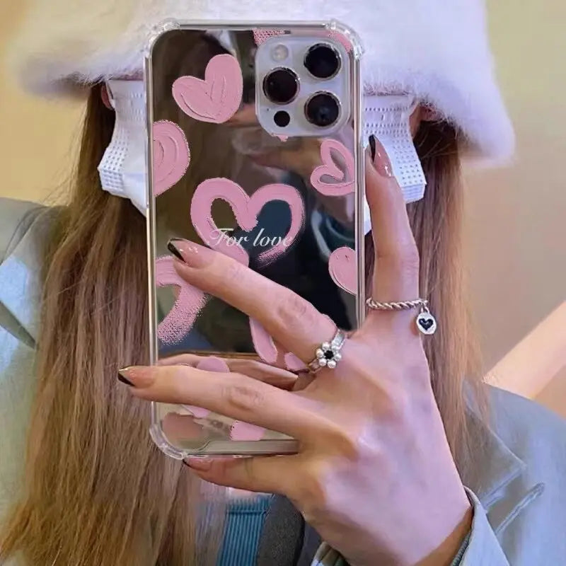 A woman wearing a white hat and holding a phone