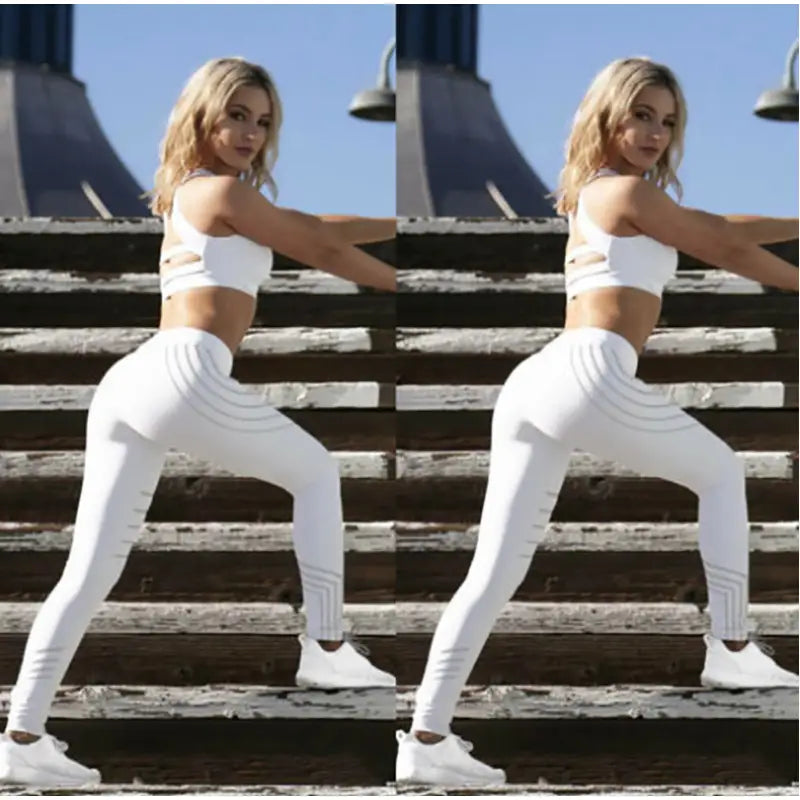 a woman in white pants and a white top