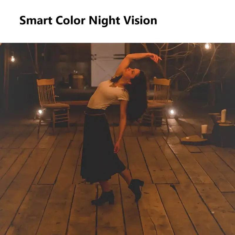 a woman dancing on a wooden floor with a light on her head