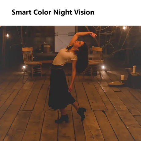 A woman dancing on a wooden floor with a light on her head