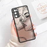 A woman’s face with a black outline on a white background, with a phone case