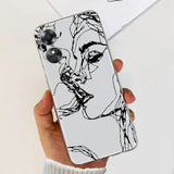 a woman’s face is drawn on a white phone case