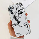 a woman’s face is drawn on a white phone case