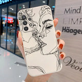 a woman’s face is drawn on a white phone case