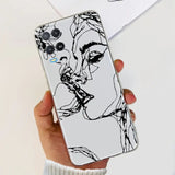a woman’s face with glasses on a white background phone case
