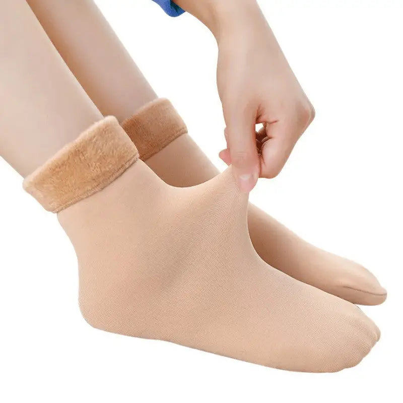 a woman’s foot with a bandage on it