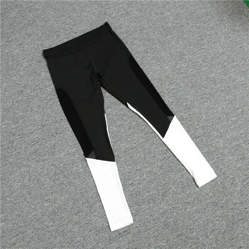 a pair of black and white leggings with a white waistband