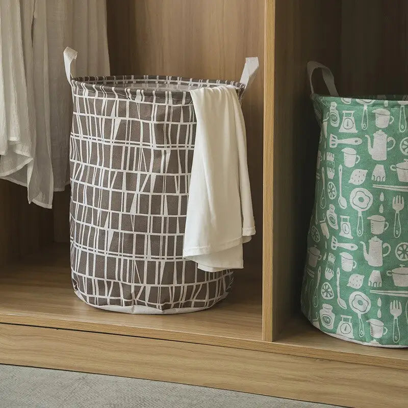 a wooden cabinet with a green and white laundry basket