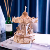 a wooden model of a carousel