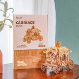 a wooden model of a carriage with a box of chocolate