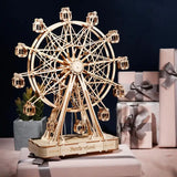 a wooden ferris with a gift box and a present