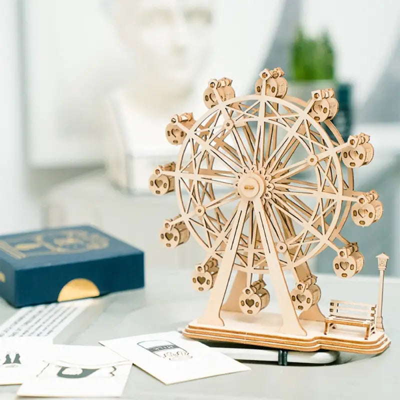 a wooden ferris with a ferris wheel on top