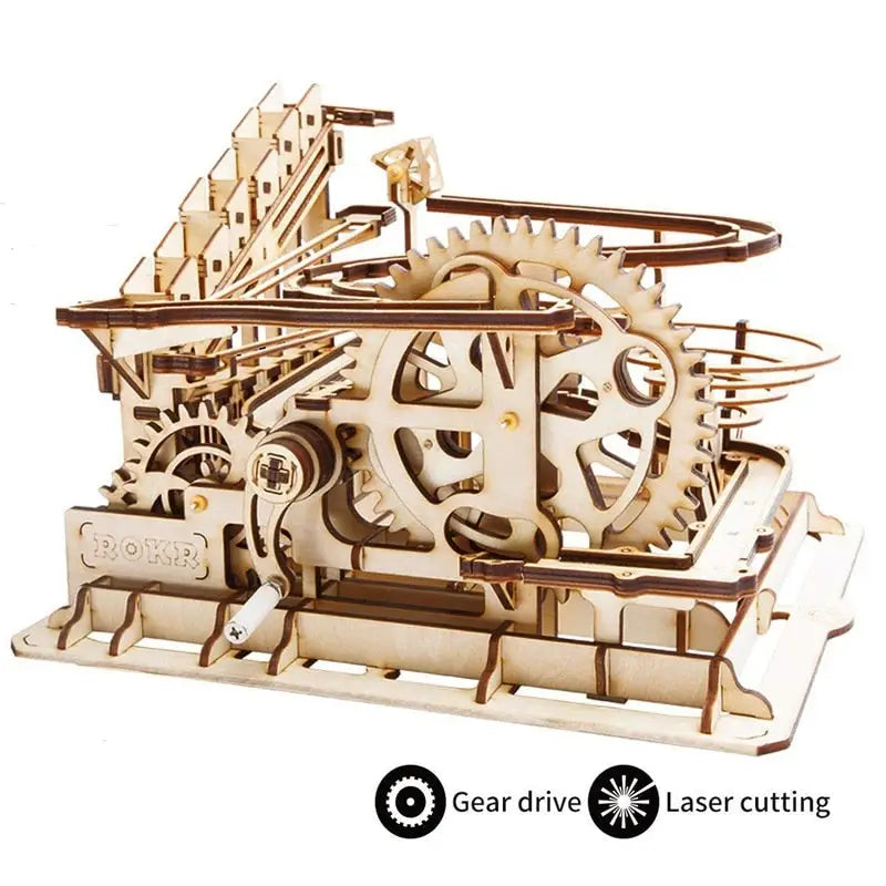 a wooden model of a machine with gears