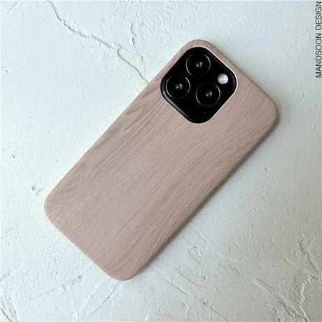 A wooden iphone case with a wooden cover