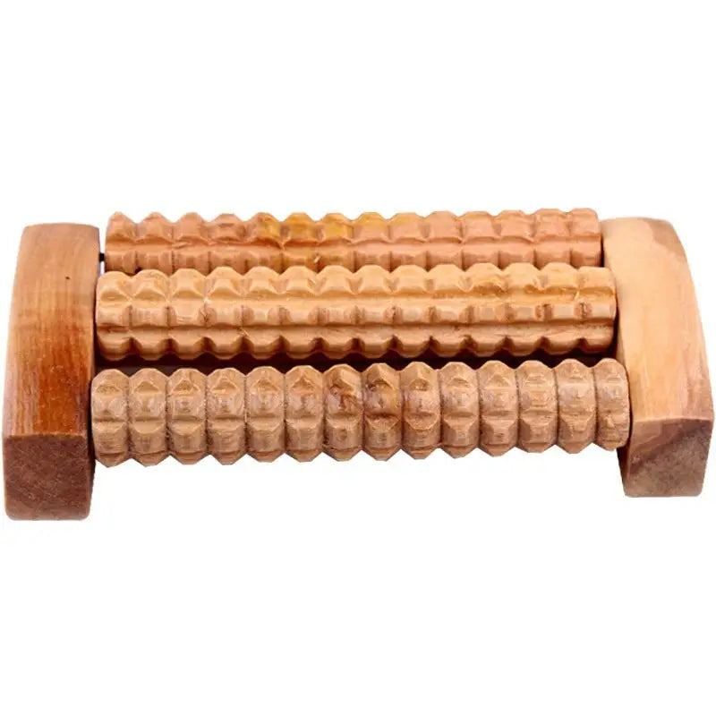 a close up of a wooden toy with a wooden roller