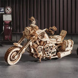 a wooden motorcycle is shown in this image