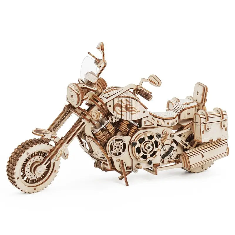 a wooden motorcycle model on a white background