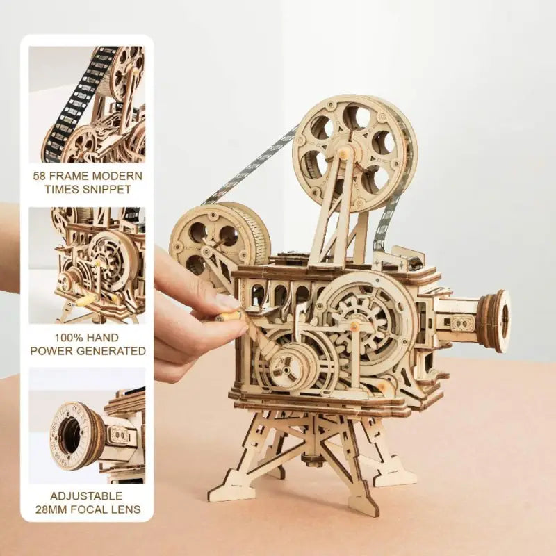 a wooden model of a movie camera