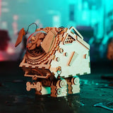 a wooden robot toy sitting on top of a table