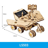 a wooden toy with a solar powered vehicle