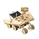 a wooden toy with a solar powered vehicle