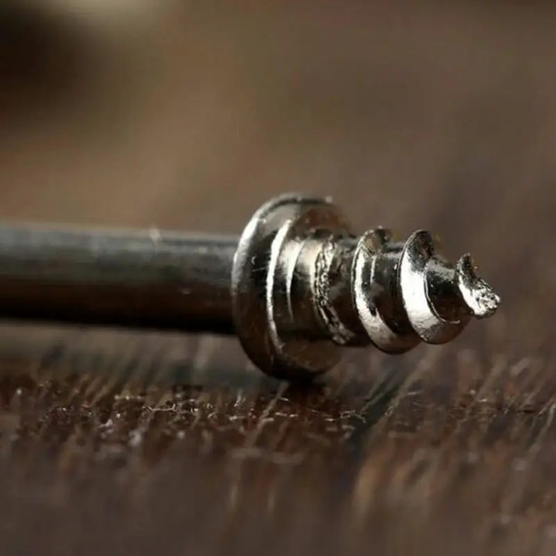 a close up shot of a screw with a screw in it