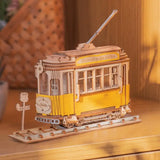 a wooden toy train sitting on top of a table