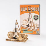 a wooden model of a violin and a box