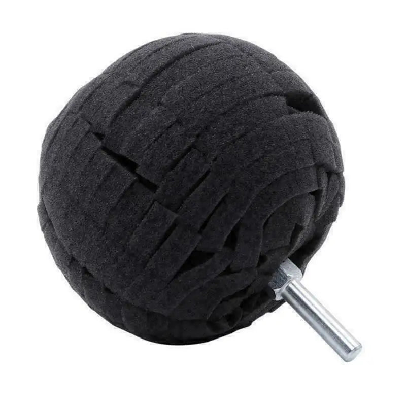 a ball of wool with a metal pin