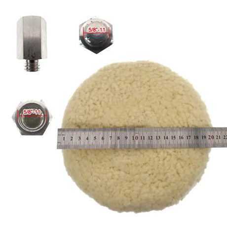 a ball of wool with a measuring tape and a measuring ruler