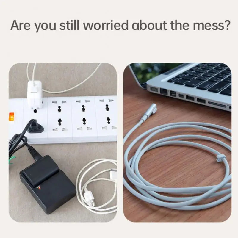 a laptop and a power strip with a cable
