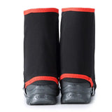 a pair of black and red boots