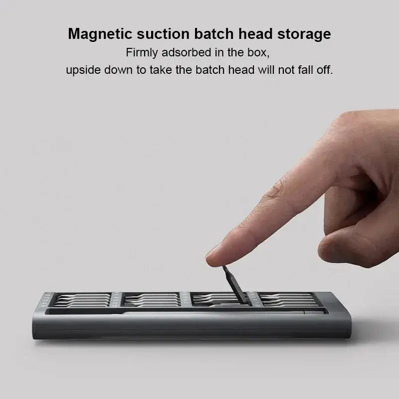 someone is using a magnet to attach a keyboard to a computer