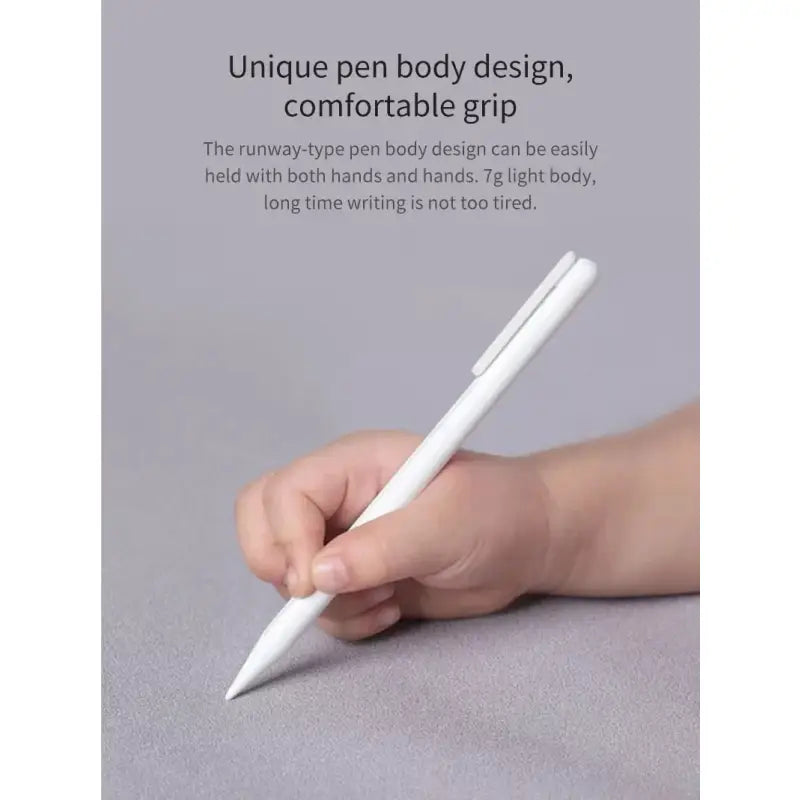 a hand holding a pen with the words,’unpenody design ’