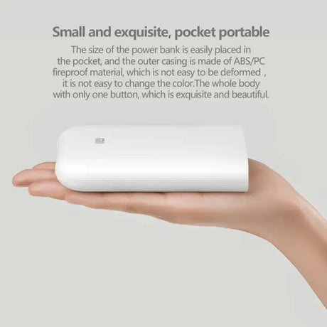 a hand holding a white box with a white background