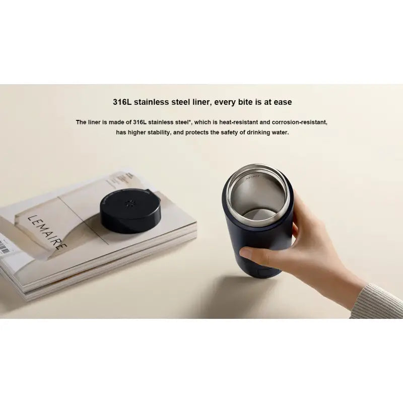 the smart speaker is being held up on a table