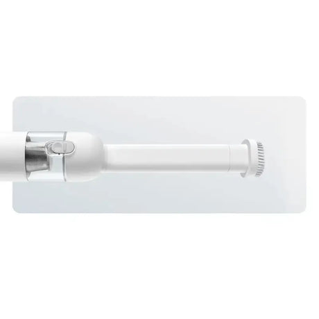 a white wall light with a white cover