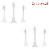 a set of four toothbrushs with different colors