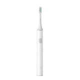 a white toothbrush with a tooth brush