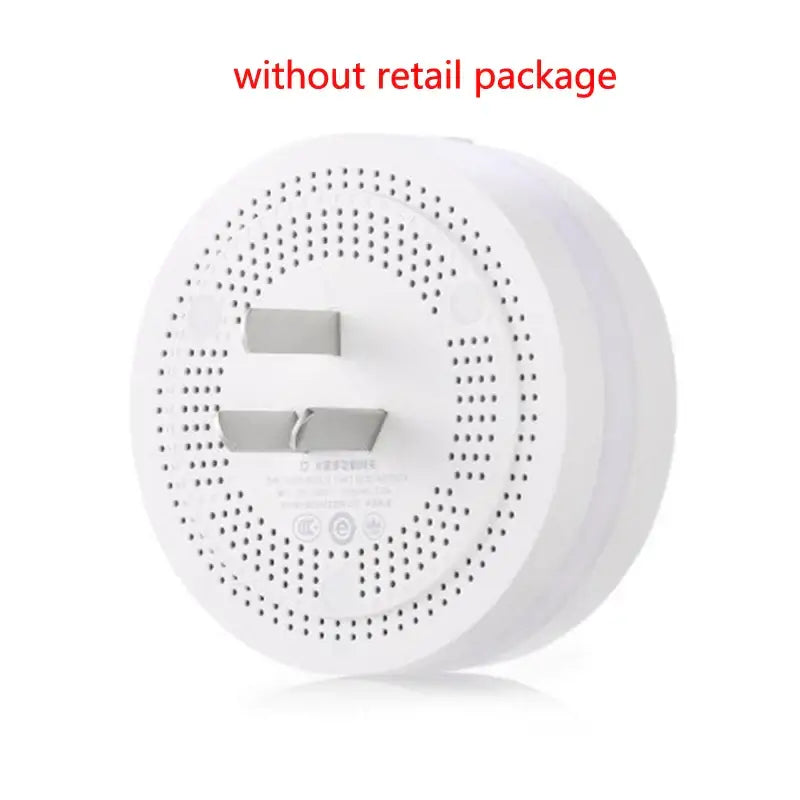 the white wireless alarm clock with the text, `’’