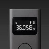 the digital alarm clock clock is shown in black