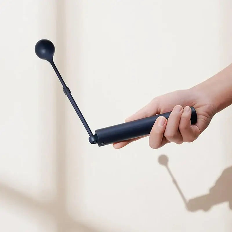 a woman holding a microphone in her hand